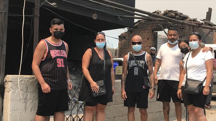 Gurbetçi aile Manavgat'ta evleri yananların yardımına koştu